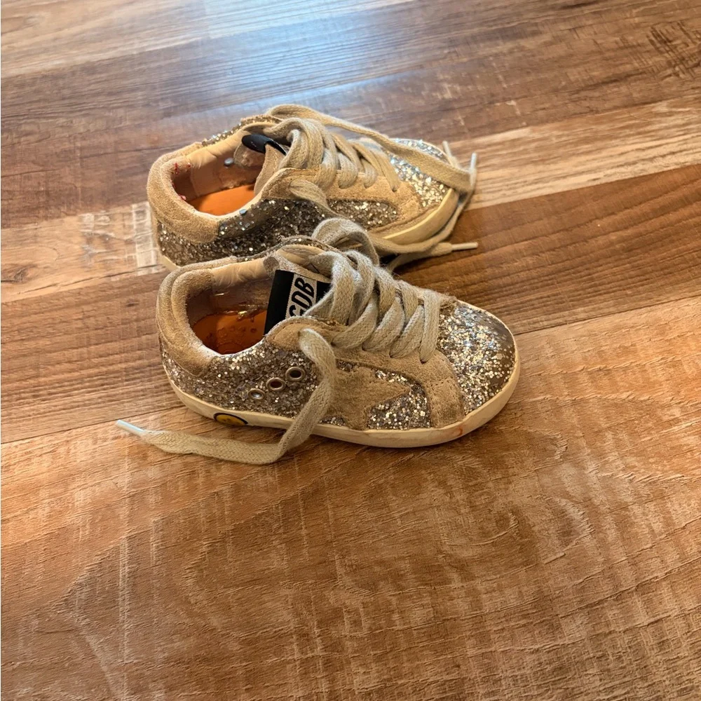 Golden Goose sparkling gold